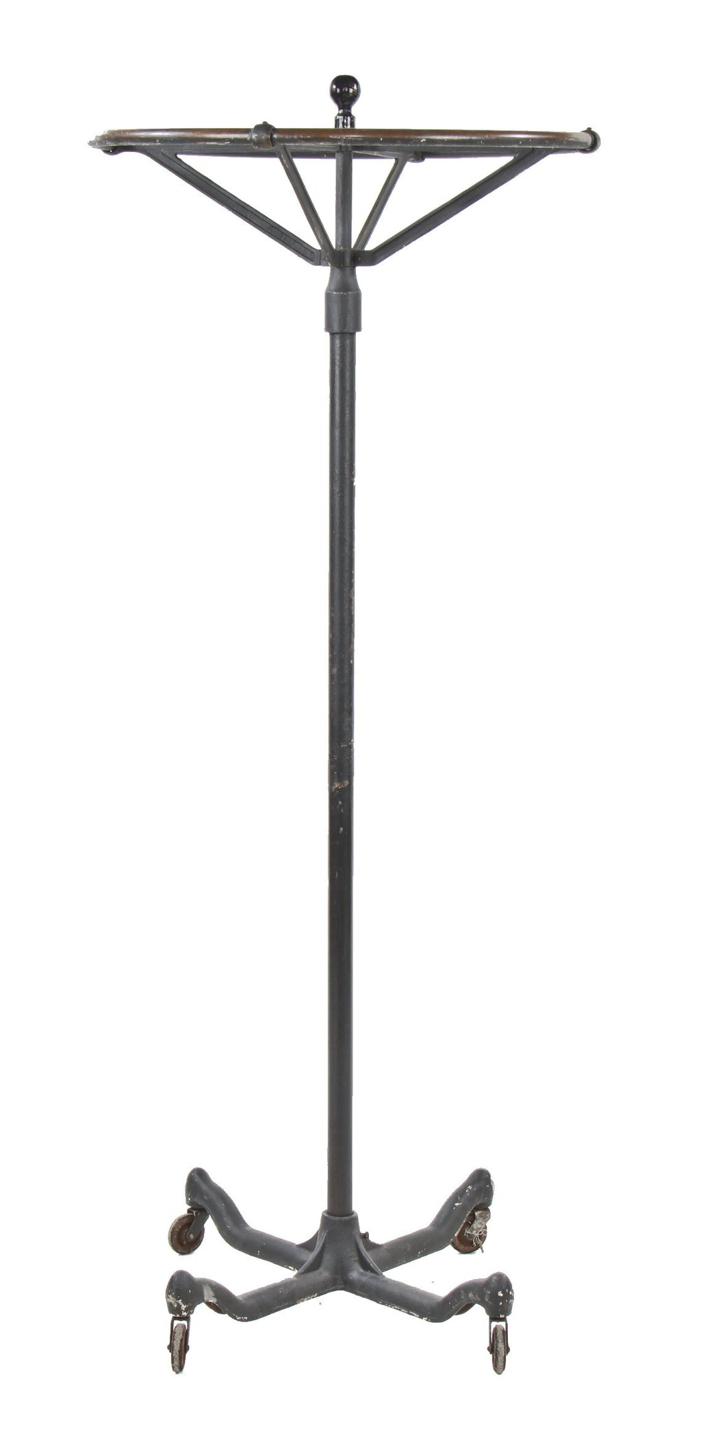 early 20th century american industrial interior clothing store black enameled "dorad" revolving garment rack with weighted cast iron base
