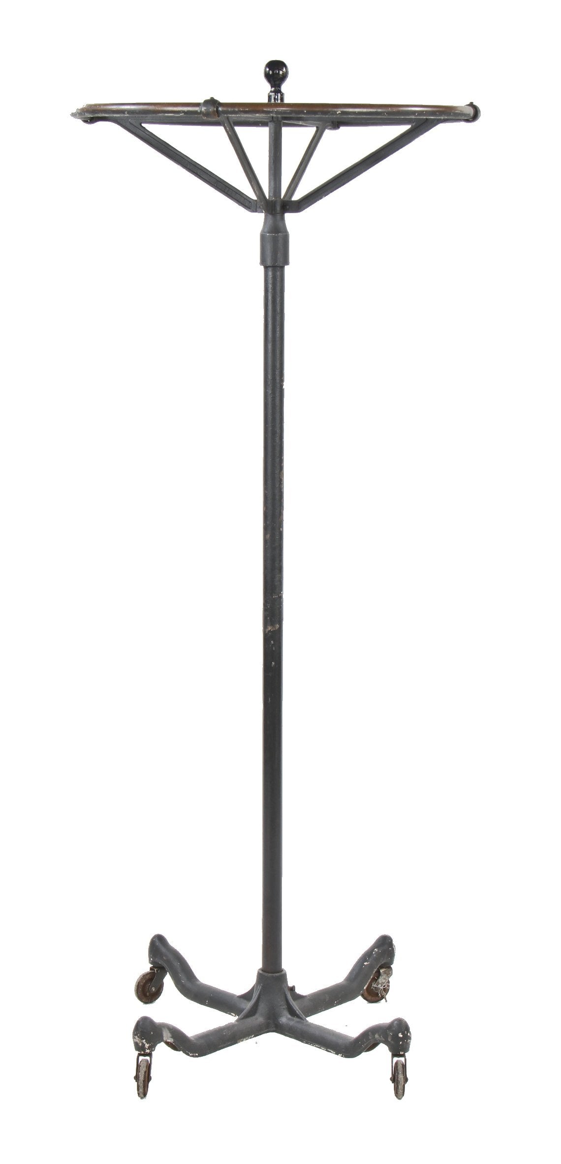 early 20th century american industrial interior clothing store black enameled "dorad" revolving garment rack with weighted cast iron base