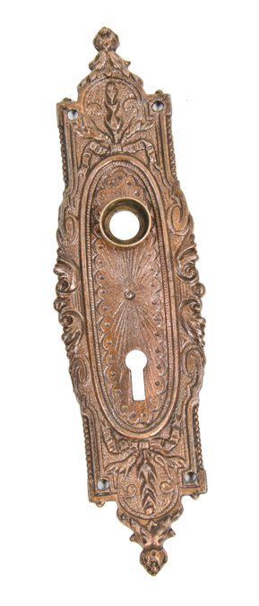remarkable early 20th century antique american ornamental copper-plated cast iron interior residential doorknob backplate