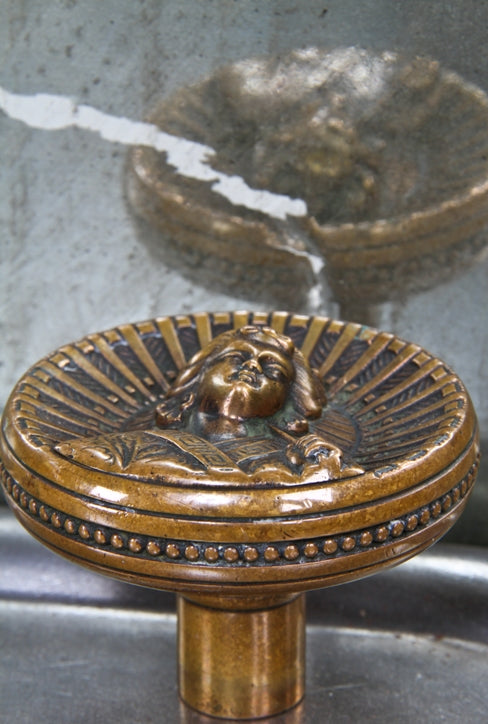sought after original and intactl c. 1880's anglo-japanese style ornamental cast brass entrance size geisha girl antique doorknob