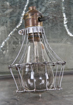 hard to find early 20th century vintage american industrial patented "holdfast" galvanized steel wire lamp guard