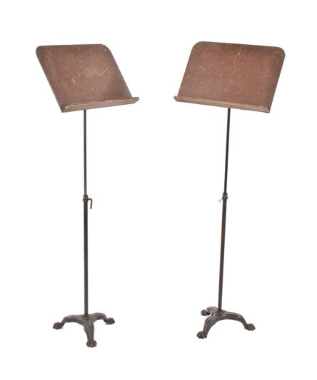 matching set of c. 1930's american theater orchestra pit adjustable height music stands with three-legged cast iron bases