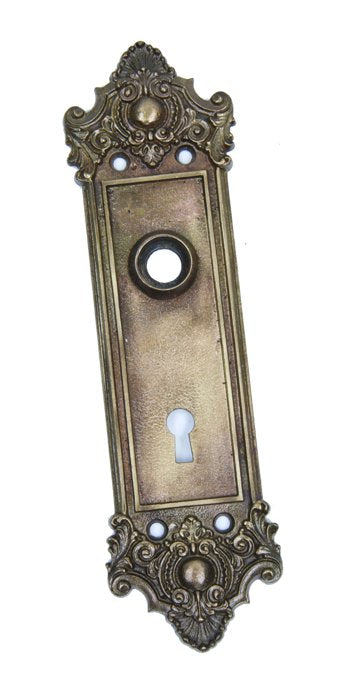 original early 20th century ornamental cast brass french renaissance style residential doorknob backplate with cartouche and foliated scrollwork