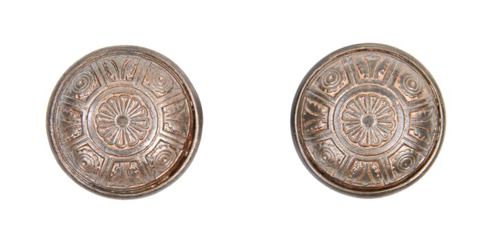 matching set of 19th century american victorian era ornamental cast iron passage size doorknobs with centrally located rosette design motif