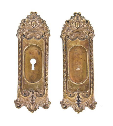 matching set of c. 1900's ornamental cast bronze interior residential "chatham" pattern sliding pocket door backplates