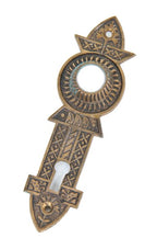 original 19th century ornamental cast bronze interior residential "screwless" passage door backplate with nicely aged patina