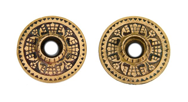 two matching c. 1880's american eastlake style ornamental cast brass interior residential doorknob rosettes with fluted thimbles