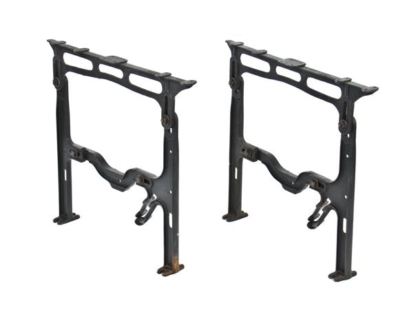 fully adjustable early 20th century black enameled cast iron brand brewery lunchroom table bases with double-sided footpads