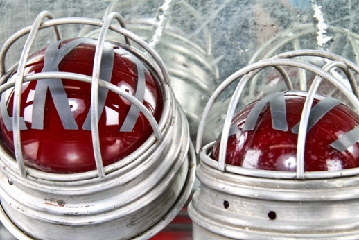 all original c. 1930's american machine age illuminated ruby red exit light with reinforced spun brass metal protective cage