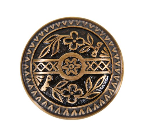 highly stylized antique american ornamental cast brass interior residential banded rim doorknob with black enameled inlay