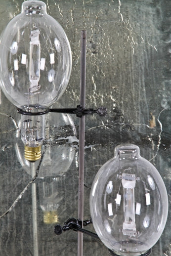 repurposed vintage industrial ornamental cast iron display stand base with three adjustable fisher ring clamps