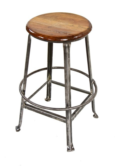 refinished angled steel four-legged american industrial stationary stool with original bent steel rod heel ring