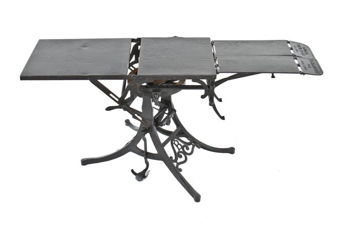 hard to find early 20th century black enameled cast iron riveted joint steel "prof. ferguson" adjsutable operating table