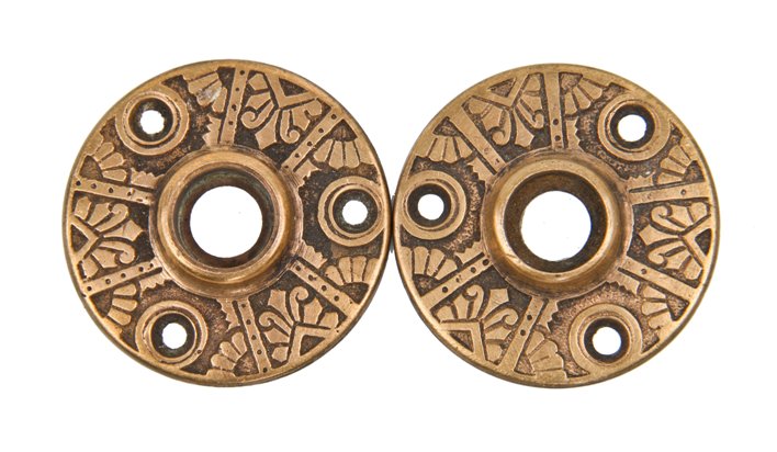 matching set of antique american c. 1880's ornamental cast brass interior residential doorknob rosettes with anthemions