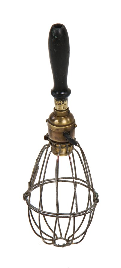 american made early electric industrial hand-held "trouble light" with uniquely shaped oblong steel wire cage or bulb guard