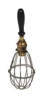 american made early electric industrial hand-held "trouble light" with uniquely shaped oblong steel wire cage or bulb guard