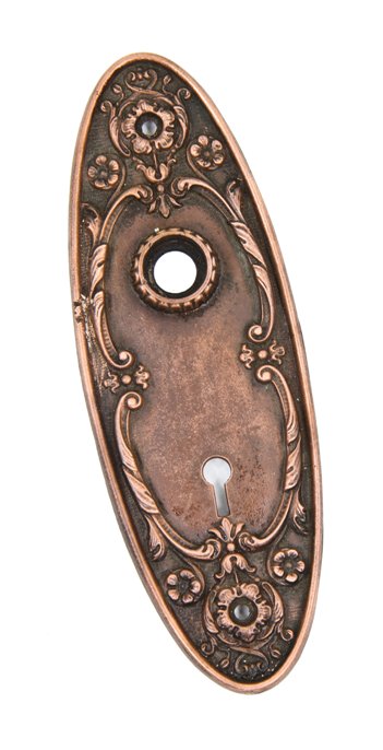 early 20th century antique american elongated ornamental cast iron interior residential doorknob backplate