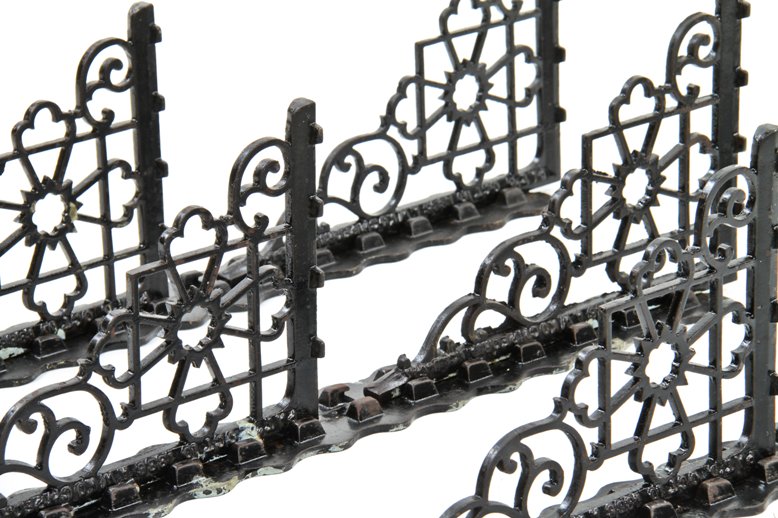 set of three matching late 19th century american industrial black enameled or "japanned" ornamental cast iron "shiftable" shelving brackets