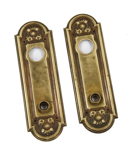 matching set of original early 20th century stamped yellow brass exterior two-flat chicago residential doorknob backplates