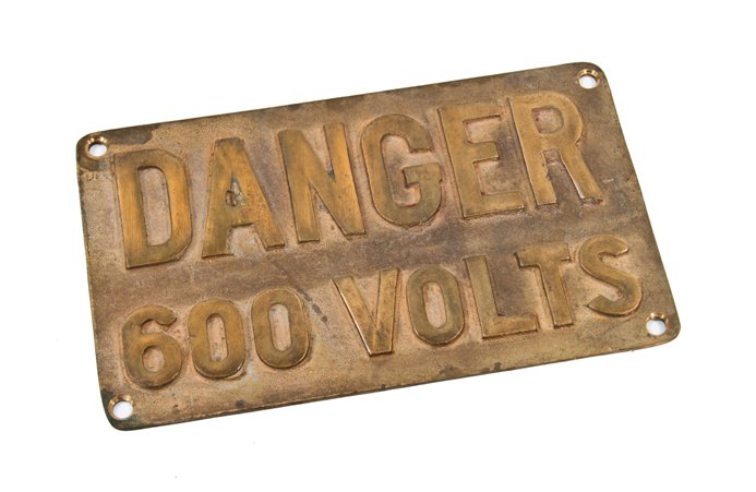 original vintage american industrial single-sided cast bronze "600 volts" railroad locomotive danger or cautionary plaque