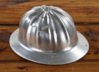 c. 1950's vintage industrial reinforced aluminum "turtle shell" tradesman hard hat with patented head protector cradle