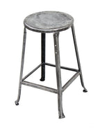 c. 1920's vintage american industrial four-legged heavy gauge angled steel factory stool with welded joint cross-bracing