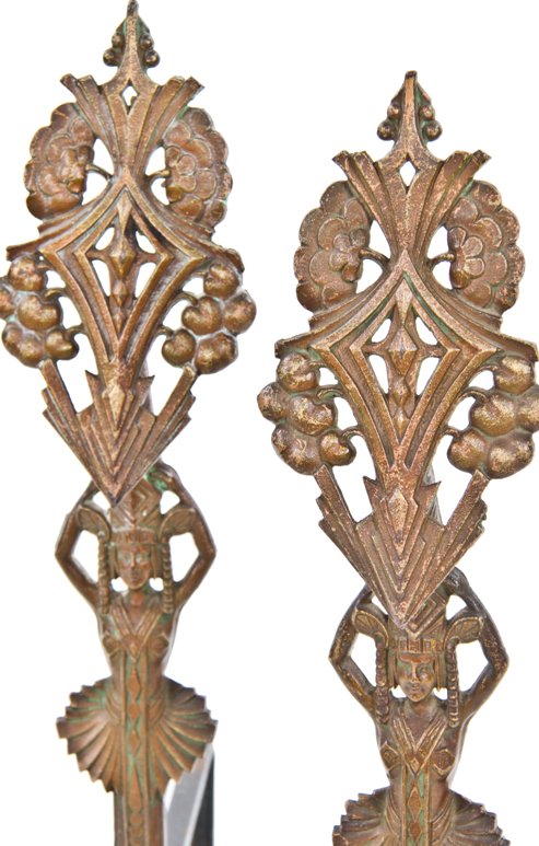 impressive set of matching c. 1930's american art deco style ornamental cast iron figural fireplace andirons with original gold enameled finish