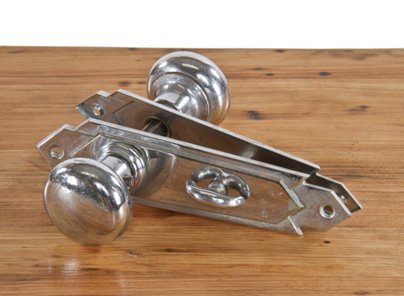 c. 1920's chrome plated stamped brass american art deco style residential passage door hardware with privacy latch