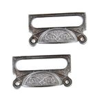 matching set of original antique 19th century ornamental cast iron apothecary cabinet drawer or bin pulls