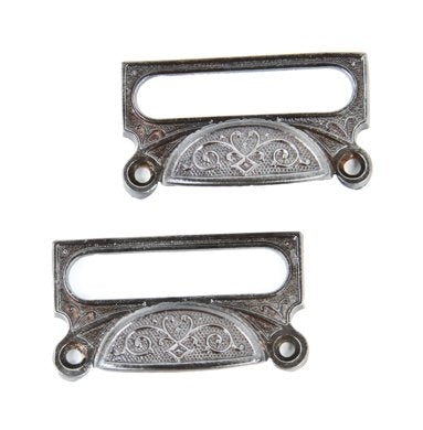 matching set of original antique 19th century ornamental cast iron apothecary cabinet drawer or bin pulls