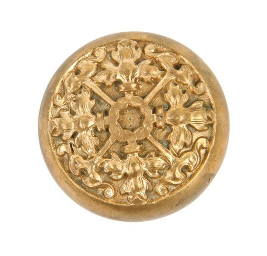 nicely aged early 20th century interior residential ornamental cast brass passage size doorknob replete with leafage