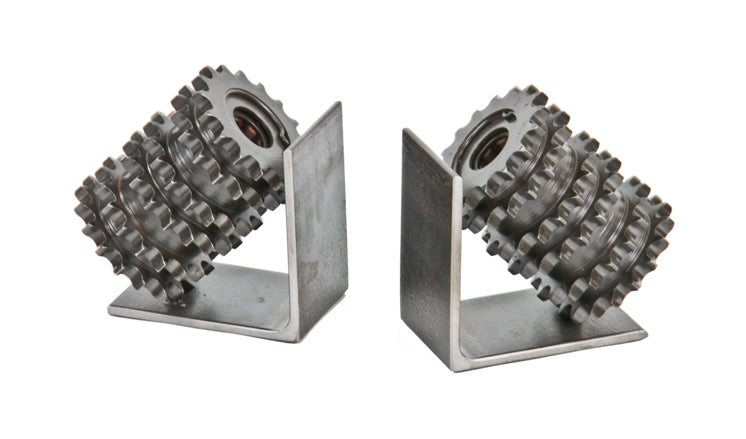 matching set of oversized american industrial repurposed welded joint angled worm gear hob bookends with uniform brushed metal finish