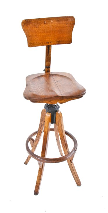 all original and completely intact early 20th century varnished oak wood adjustable height switchboard operator chair with footrest