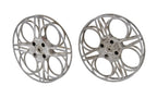 vintage american oversized goldberg brothers cast aluminum filmstrip reel with highly stylized design