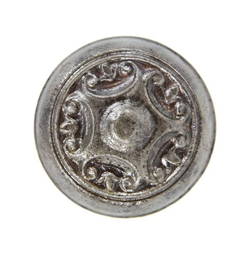 refinished early 20th century antique american decorative wrought steel passage size doorknob with c-scrolls surrounding a button