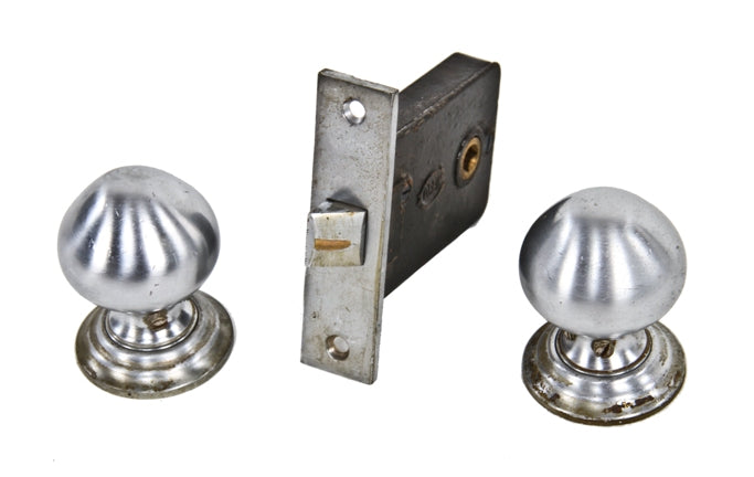 original c. 1930's american machine age tulip-shaped solid chrome-plated bronze hospital room doorknob with matching rosettes and mortise lock