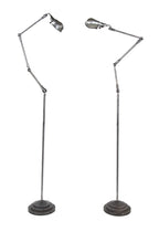 matching pair of all original c. 1940's vintage american industrial articulating arm floor lamps with "stepped" weighted metal bases