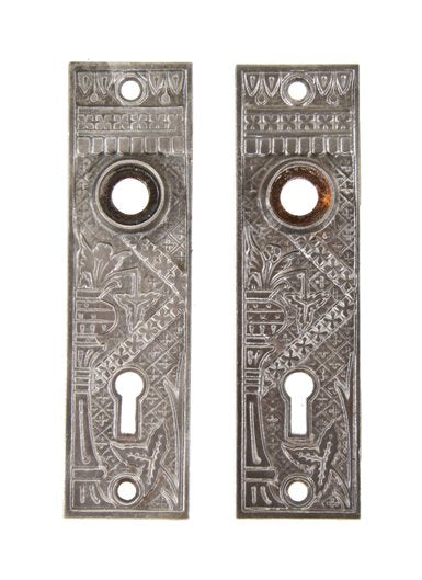 late 19th century american eastlake style ornamental cast iron "broken leaf" pattern residential passage door escutcheons