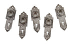 group of five matching original antique american decorative cast iron "screwless spindle" doorknob escutcheons or backplates