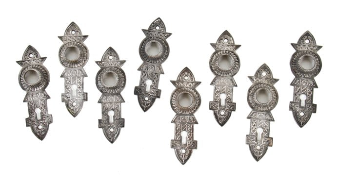 large lot of matching 19th century american ornamental cast iron interior residential "niles-chicago" doorknob escutcheons
