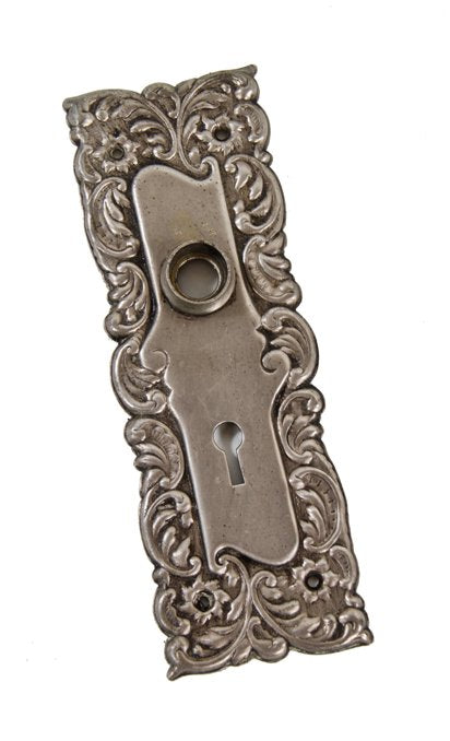 c. 1900's original antique american art nouveau style "eulalia" pattern nickel-plated stamped brass passage door backplate