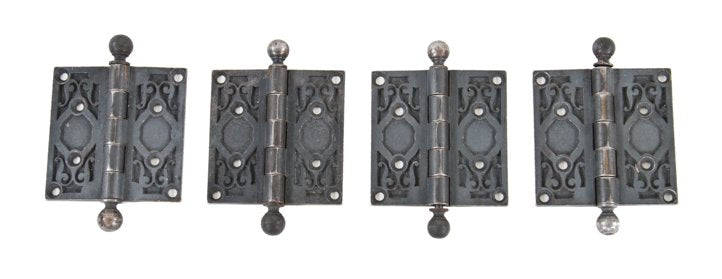 group of four matching late 19th century ornamental cast iron reliance building interior utility door ball finial hinges