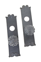 matching set of original late 19th century interior reliance building ornamental cast iron doorknobs and escutcheons