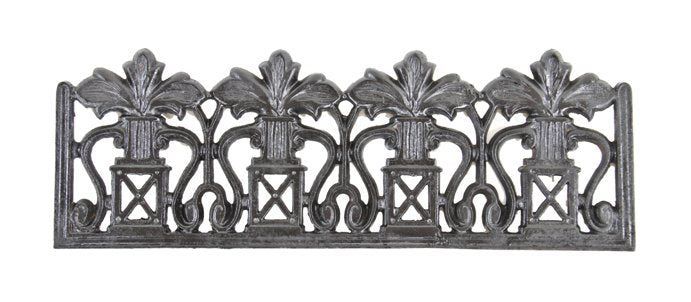 original late 19th century black enameled ornamental cast iron residential gas fireplace replacement grille with leafage and scrollwork