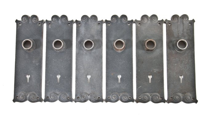 six matching late 19th century ornamental cast iron interior reliance building passage door escutcheons with bower-barff plated finish