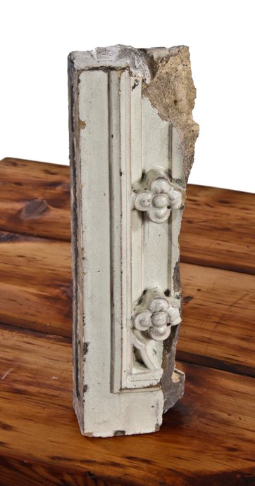 late 19th century exterior reliance office building white glazed terra cotta fragment containing deeply embossed floral quatrefoils