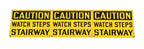 three matching brightly colored single-sided die cut steel hospital boiler room "watch steps" cautionary or danger signs