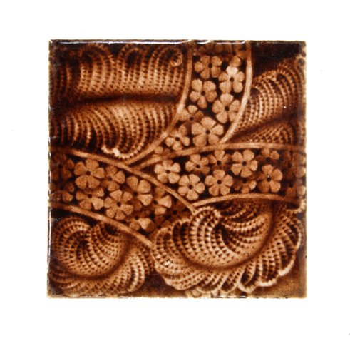 american 19th century victorian era interior residential ceramic fireplace tile with reddish-brown majolica clear glazed finish