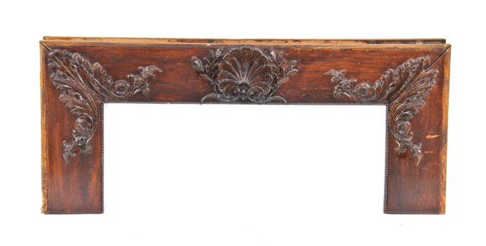 largely intact late 19th century american double-sided residential varnished oak wood door surround embellished with gesso ornament