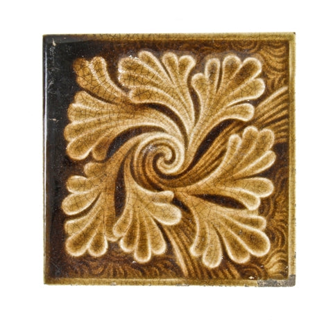 original 19th century american antique victorian era interior residential fireplace tile with centrally located swirled foliation